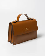 Shop Women's Italian-made Cuoieria Fiorentina Italian Leather Beauty Small Flap Bag in Lion (B000006042420) or browse our range of hand-made Italian handbags for women in-store at Aliverti Cape Town, or shop online. 

We deliver in South Africa & offer multiple payment plans as well as accept multiple safe & secure payment methods.