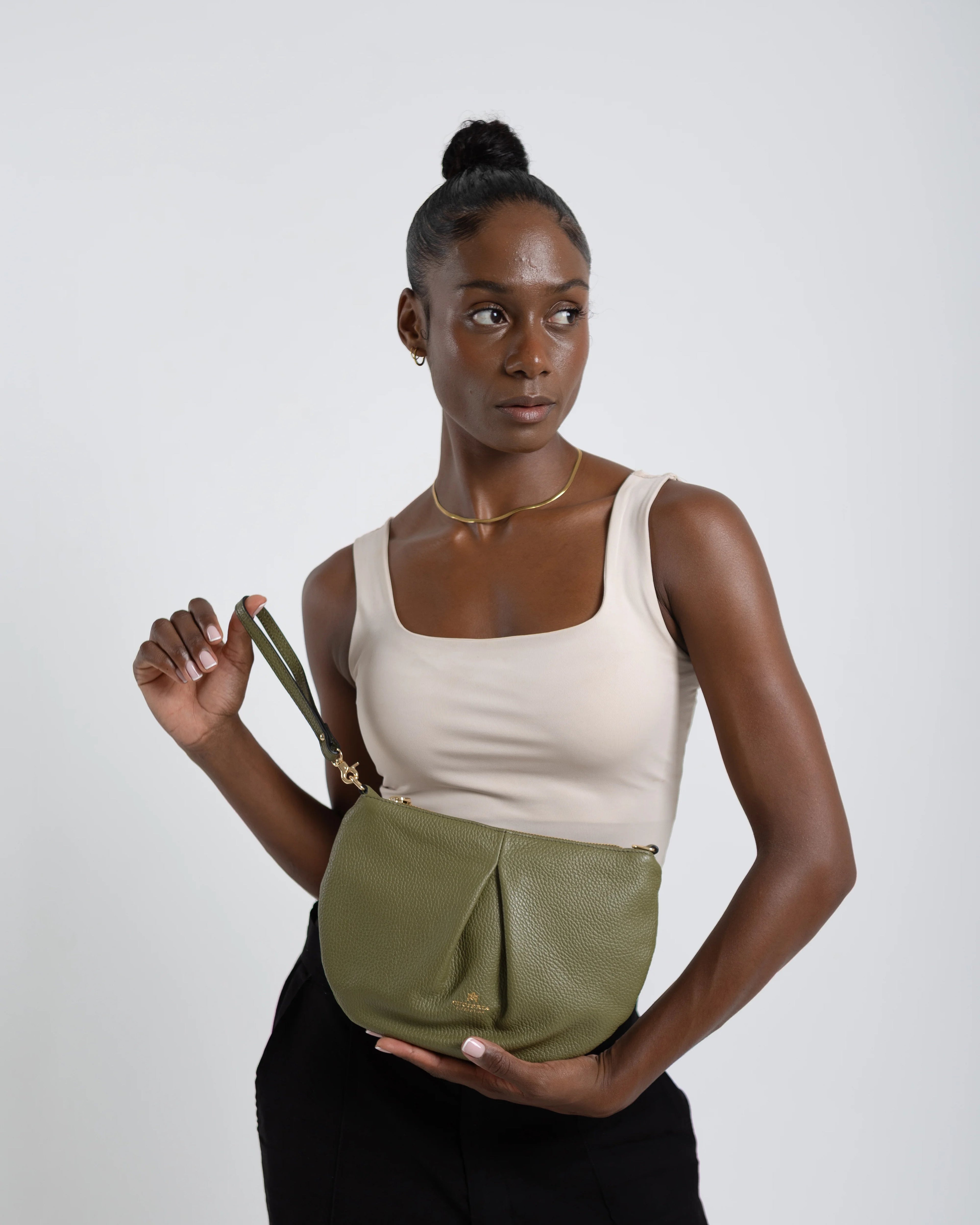 Shop Women's Italian-made Cuoieria Fiorentina Italian Leather Emma Pouch in Militare (B000006003230) or browse our range of hand-made Italian handbags for women in-store at Aliverti Cape Town, or shop online. 

We deliver in South Africa & offer multiple payment plans as well as accept multiple safe & secure payment methods.