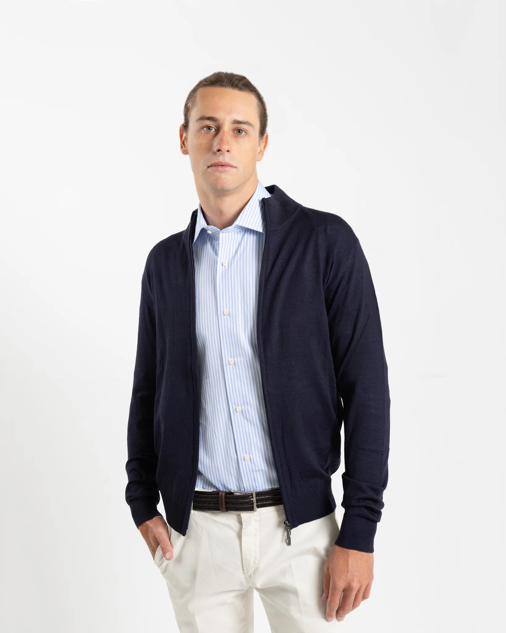 Shop Fusaro Antonio Full-Zip Fine Knit Cardigan in Navy Blue or browse our range of men's Italian clothing and shoes in leather in-store at Aliverti Cape Town, or shop online. We deliver in South Africa & offer multiple payment plans as well as accept multiple safe & secure payment methods. A light, smooth cardigan. Full-zip construction and stand collar, but in a fine merino knit that sits closer to the body and layers effortlessly under a coat. Two ribbed-trim side pockets add function without breaking th