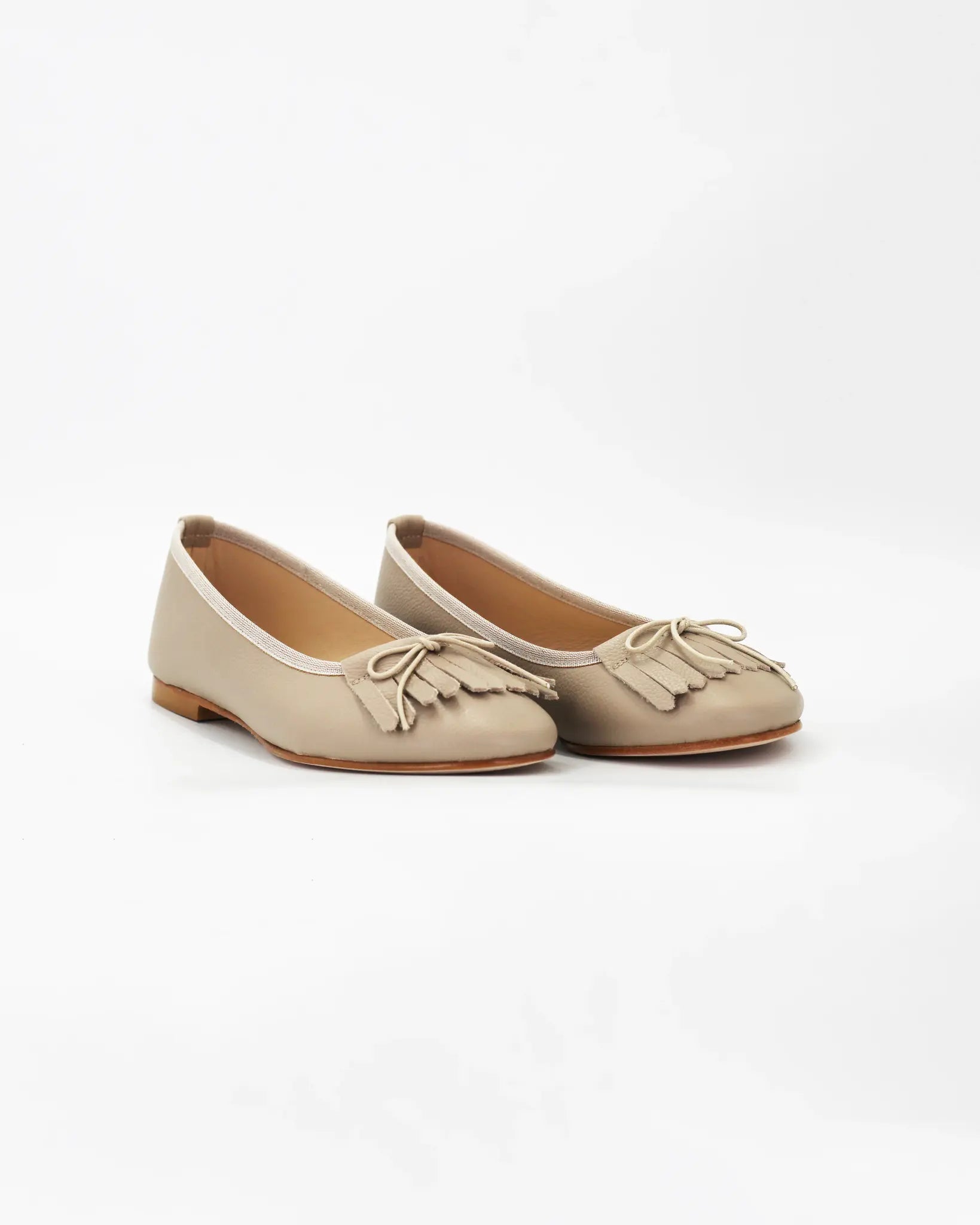 Shop Handmade Women's Ballerina Pump with Fringe in Calf Leather Beige or browse our range of hand-made Italian shoes in leather or suede in-store at Aliverti Cape Town, or shop online. We deliver in South Africa & offer multiple payment plans as well as accept multiple safe & secure payment methods.
