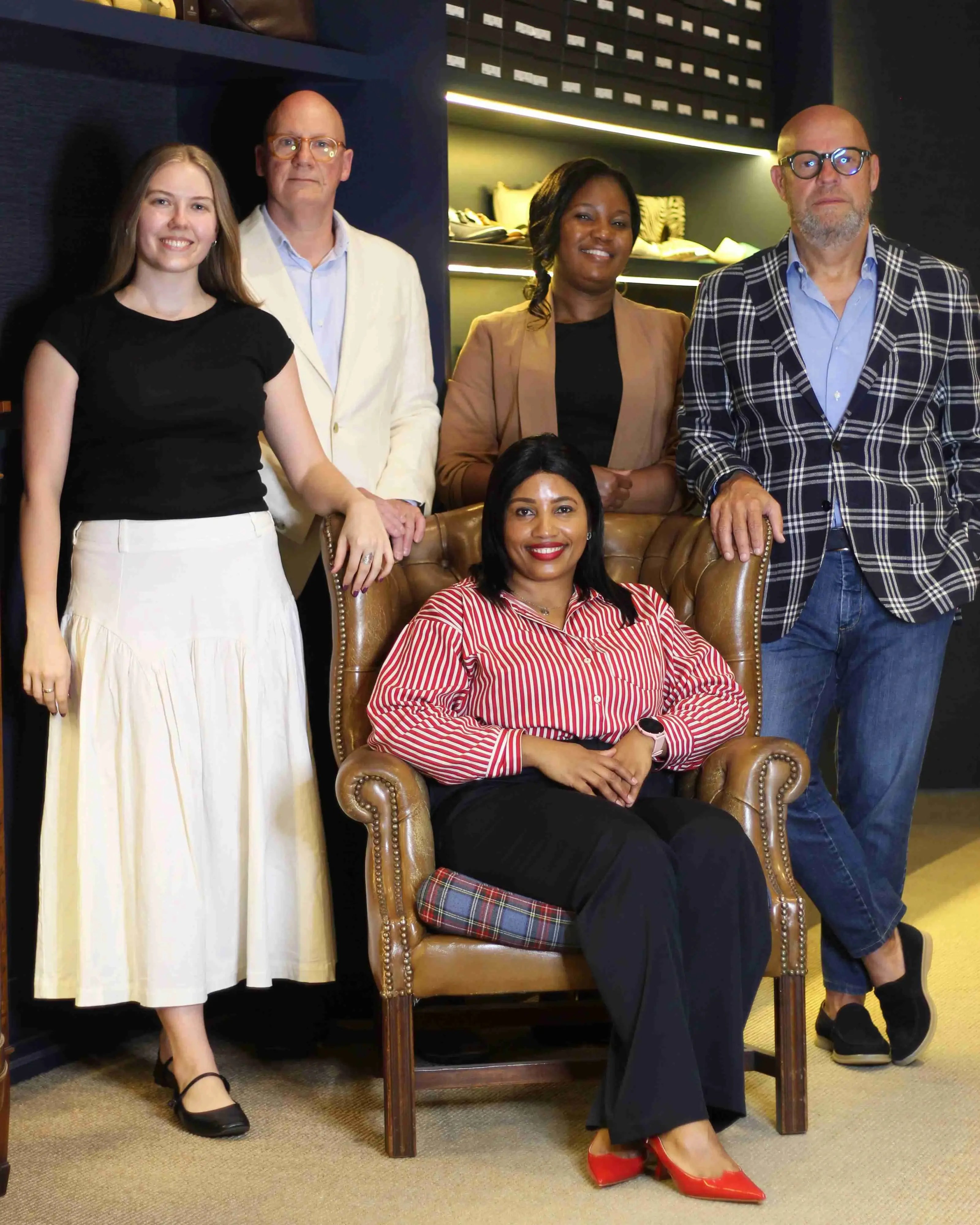 The Aliverti Cape Town team of five people posing together at the Aliverti Cape Town store, 50 Kloof Street, Cape Town.