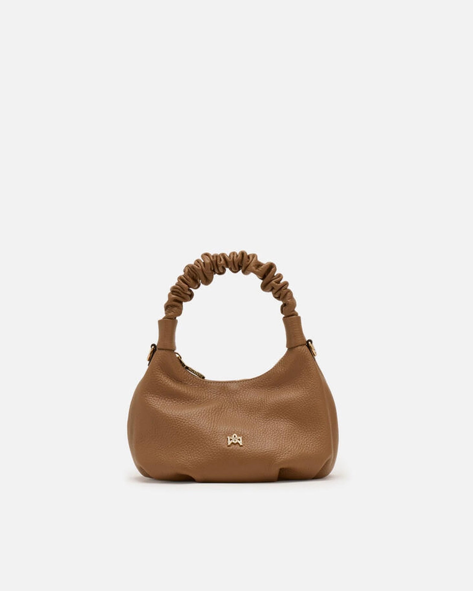 Description
Small but full of character, the mini hobo from the Chop line is the accessory that adds a touch of playful femininity to any outfit. Its soft design and ruched shoulder strap express a relaxed elegance, while the artisanal quality of the materials brings a sophisticated touch. Perfect for evenings out or casual weekends, it's a bag that surprises with its lightness and authentic style.

Composition
Suede is made from the lower part of the leather, which is softer and more flexible than the oute