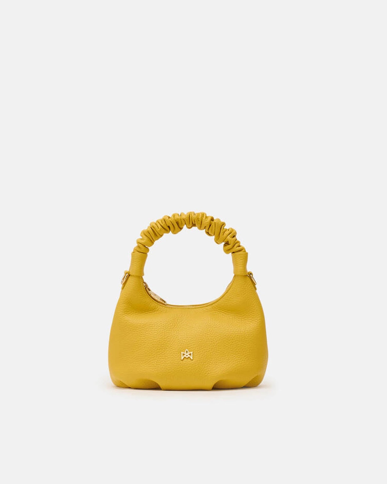 Description
Small but full of character, the mini hobo from the Chop line is the accessory that adds a touch of playful femininity to any outfit. Its soft design and ruched shoulder strap express a relaxed elegance, while the artisanal quality of the materials brings a sophisticated touch. Perfect for evenings out or casual weekends, it's a bag that surprises with its lightness and authentic style.

Composition
Suede is made from the lower part of the leather, which is softer and more flexible than the oute