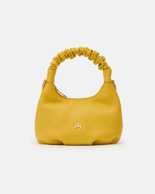 Description
Small but full of character, the mini hobo from the Chop line is the accessory that adds a touch of playful femininity to any outfit. Its soft design and ruched shoulder strap express a relaxed elegance, while the artisanal quality of the materials brings a sophisticated touch. Perfect for evenings out or casual weekends, it's a bag that surprises with its lightness and authentic style.

Composition
Suede is made from the lower part of the leather, which is softer and more flexible than the oute