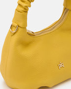 Description
Small but full of character, the mini hobo from the Chop line is the accessory that adds a touch of playful femininity to any outfit. Its soft design and ruched shoulder strap express a relaxed elegance, while the artisanal quality of the materials brings a sophisticated touch. Perfect for evenings out or casual weekends, it's a bag that surprises with its lightness and authentic style.

Composition
Suede is made from the lower part of the leather, which is softer and more flexible than the oute