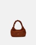 Description
Small but full of character, the mini hobo from the Chop line is the accessory that adds a touch of playful femininity to any outfit. Its soft design and ruched shoulder strap express a relaxed elegance, while the artisanal quality of the materials brings a sophisticated touch. Perfect for evenings out or casual weekends, it's a bag that surprises with its lightness and authentic style.

Composition
Suede is made from the lower part of the leather, which is softer and more flexible than the oute