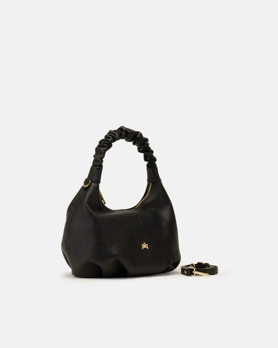 Description
The medium Chop hobo is designed for those who appreciate everyday elegance made of softness and refined details. The ruched shoulder strap and enveloping silhouette gracefully interpret the boho spirit of the season, while the high-quality materials give it an authentic and accessible charm. A perfect style companion for any moment.

Composition
This soft full-grain calfskin, is worked to obtain an uniform grain, called tumbled leather. The remarkable fullness and roundness of the hand make it 