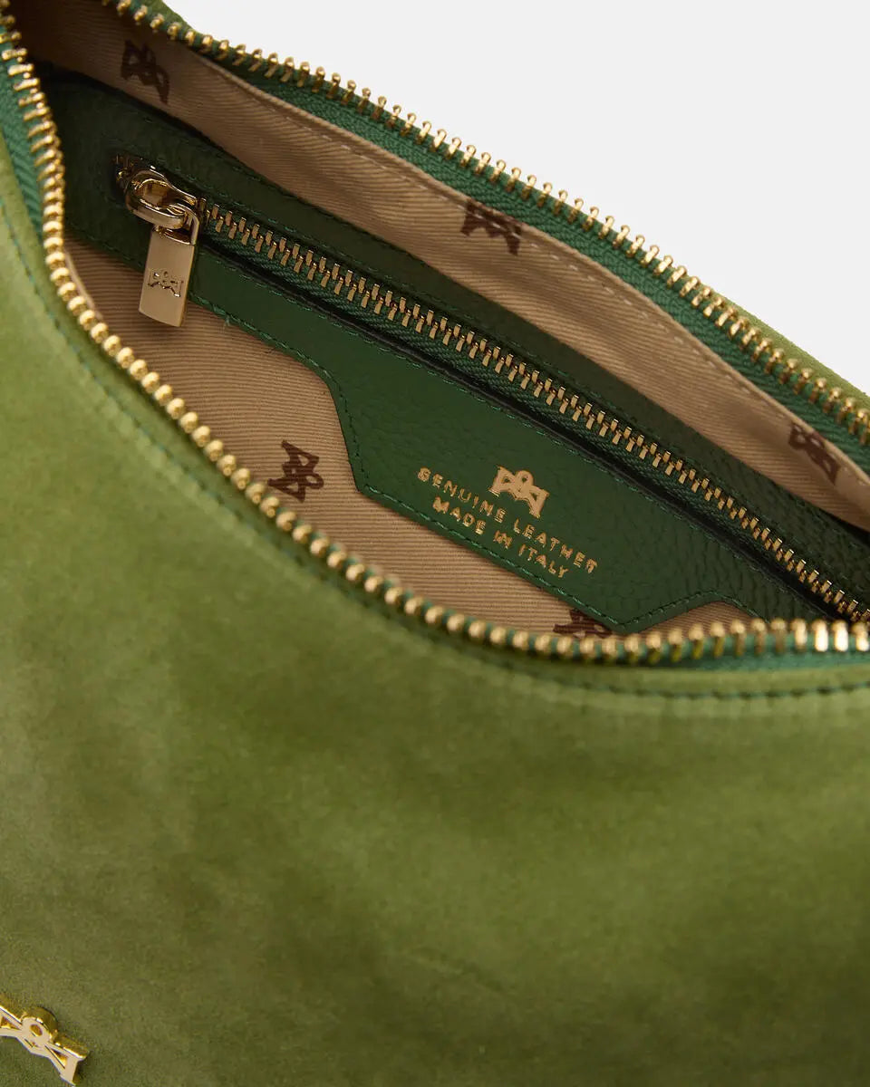 Description
The medium Chop hobo is designed for those who appreciate everyday elegance made of softness and refined details. The ruched shoulder strap and enveloping silhouette gracefully interpret the boho spirit of the season, while the high-quality materials give it an authentic and accessible charm. A perfect style companion for any moment.

Composition
This soft full-grain calfskin, is worked to obtain an uniform grain, called tumbled leather. The remarkable fullness and roundness of the hand make it 