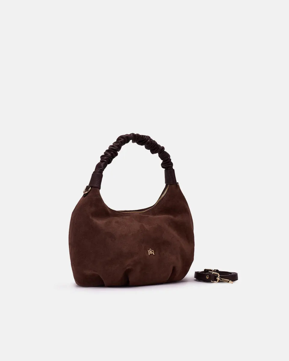 Description
The medium Chop hobo is designed for those who appreciate everyday elegance made of softness and refined details. The ruched shoulder strap and enveloping silhouette gracefully interpret the boho spirit of the season, while the high-quality materials give it an authentic and accessible charm. A perfect style companion for any moment.

Composition
This soft full-grain calfskin, is worked to obtain an uniform grain, called tumbled leather. The remarkable fullness and roundness of the hand make it 