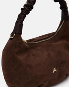 Description
The medium Chop hobo is designed for those who appreciate everyday elegance made of softness and refined details. The ruched shoulder strap and enveloping silhouette gracefully interpret the boho spirit of the season, while the high-quality materials give it an authentic and accessible charm. A perfect style companion for any moment.

Composition
This soft full-grain calfskin, is worked to obtain an uniform grain, called tumbled leather. The remarkable fullness and roundness of the hand make it 