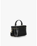 Beauty bag made of precious lambskin with a wrinkled effect and a delicate polished finish, with hand handle and adjustable and removable leather shoulder strap.

Upper zipper. The bag is equipped with a practical makeup mirror and a leather lipstick compartment.

Accessories with gold finish.

Material: Moon lamb
Dimensions: 19x14x10 cm
