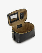 Beauty bag made of precious lambskin with a wrinkled effect and a delicate polished finish, with hand handle and adjustable and removable leather shoulder strap.

Upper zipper. The bag is equipped with a practical makeup mirror and a leather lipstick compartment.

Accessories with gold finish.

Material: Moon lamb
Dimensions: 19x14x10 cm