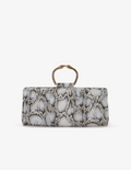 Clutch in precious snake leather with rounding rigid body and removable leather crossbody.Brass bracelet, iconic accessory of the Tramontano archive handcrafted.Top closure with double magnets. Microfiber lining. Accessories in gold finish. Material: Snake ElapheDimensions: 31x12x8 cm