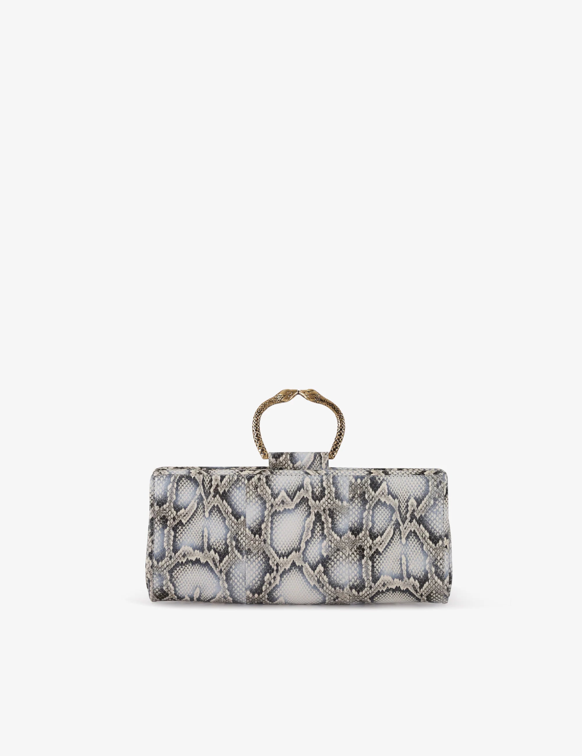 Clutch in precious snake leather with rounding rigid body and removable leather crossbody.Brass bracelet, iconic accessory of the Tramontano archive handcrafted.Top closure with double magnets. Microfiber lining. Accessories in gold finish. Material: Snake ElapheDimensions: 31x12x8 cm