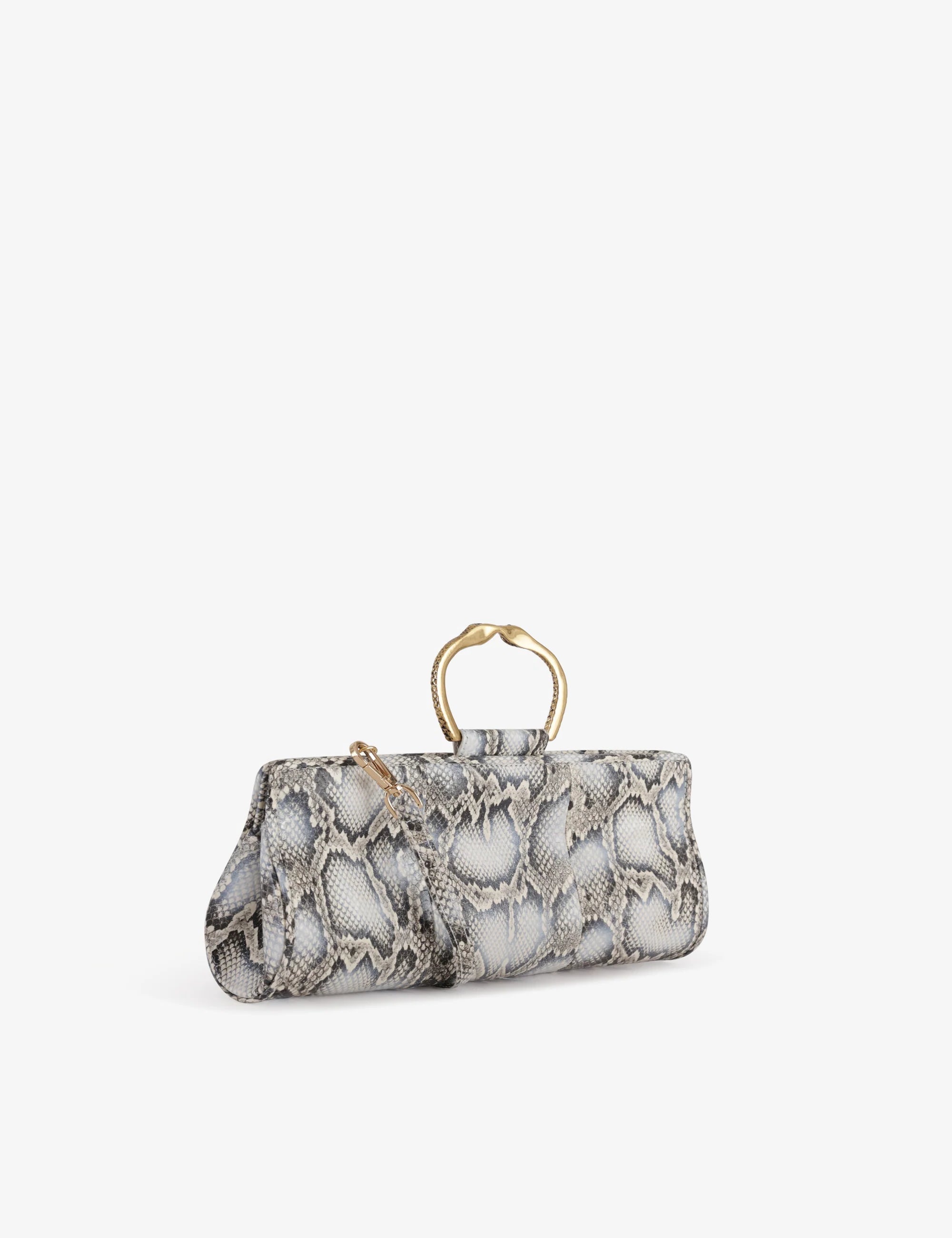 Clutch in precious snake leather with rounding rigid body and removable leather crossbody.Brass bracelet, iconic accessory of the Tramontano archive handcrafted.Top closure with double magnets. Microfiber lining. Accessories in gold finish. Material: Snake ElapheDimensions: 31x12x8 cm