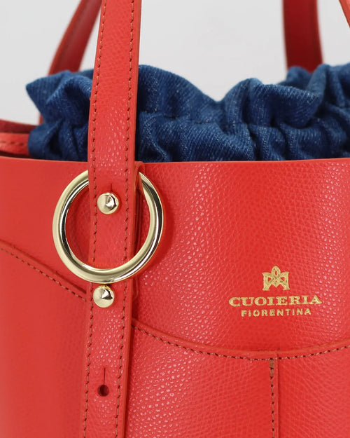 Cuoieria Fiorentina Amber Small Bucket in calf leather Corallo and denim (B000005908008) or browse our range of hand-made Italian handbags for women in-store at Aliverti Cape Town, or shop online. 

We deliver in South Africa & offer multiple payment plans as well as accept multiple safe & secure payment methods.