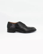 Shop Handmade Italian Leather Oxford in Nero (BRU11278)  or browse our range of hand-made Italian shoes for men in leather or suede in-store at Aliverti Cape Town, or shop online. We deliver in South Africa & offer multiple payment plans as well as accept multiple safe & secure payment methods.