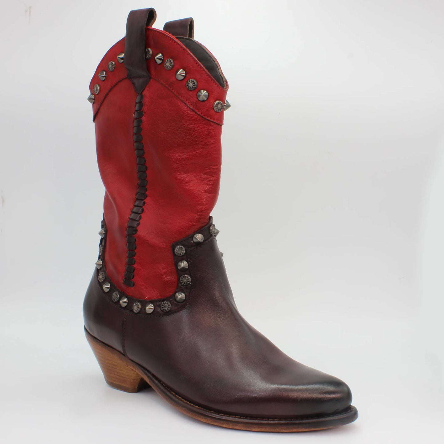 Code: JP34263/4Style: Western bootFeature: studsColour: Red and brownMaterial: Calf leatherSole Material: rubber Made in Italy