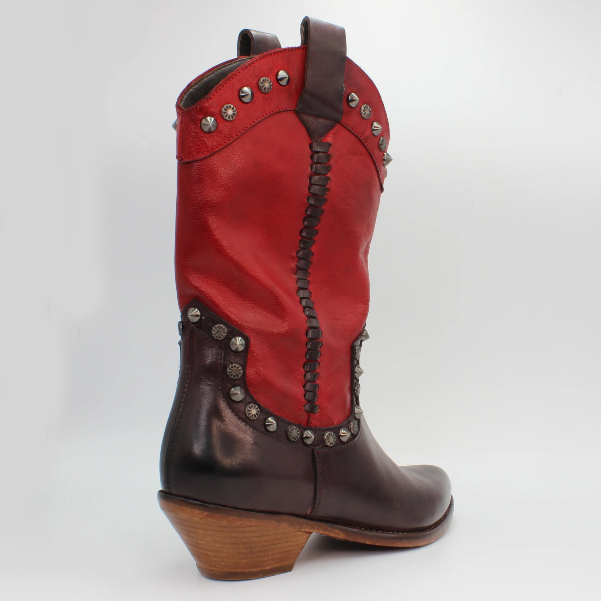 Code: JP34263/4Style: Western bootFeature: studsColour: Red and brownMaterial: Calf leatherSole Material: rubber Made in Italy
