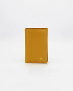 A small, lightweight wallet that can hold all the essentials. To have everything you need with you even on the most important evenings, without sacrificing style.

Internal details: double compartment with button closure, 6 credit card slots, 4 pockets, double bill compartment and zipped purse.
External details: gold embossed logo.
Lining: customised and internal slot in silk.

This soft full-grain calfskin, is worked to obtain an uniform grain, called tumbled leather. The remarkable fullness and roundness 