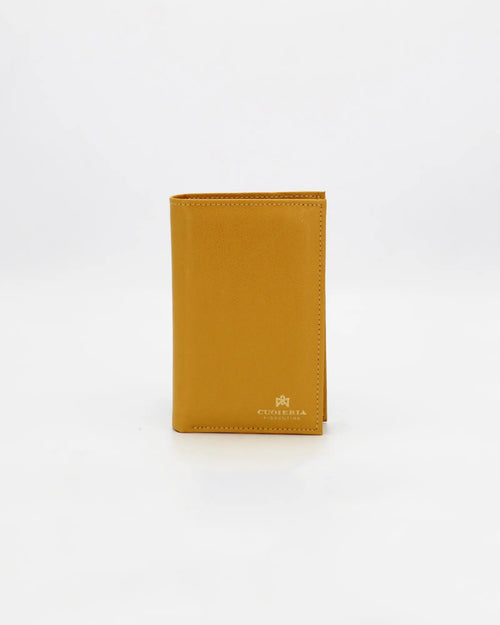 A small, lightweight wallet that can hold all the essentials. To have everything you need with you even on the most important evenings, without sacrificing style.

Internal details: double compartment with button closure, 6 credit card slots, 4 pockets, double bill compartment and zipped purse.
External details: gold embossed logo.
Lining: customised and internal slot in silk.

This soft full-grain calfskin, is worked to obtain an uniform grain, called tumbled leather. The remarkable fullness and roundness 