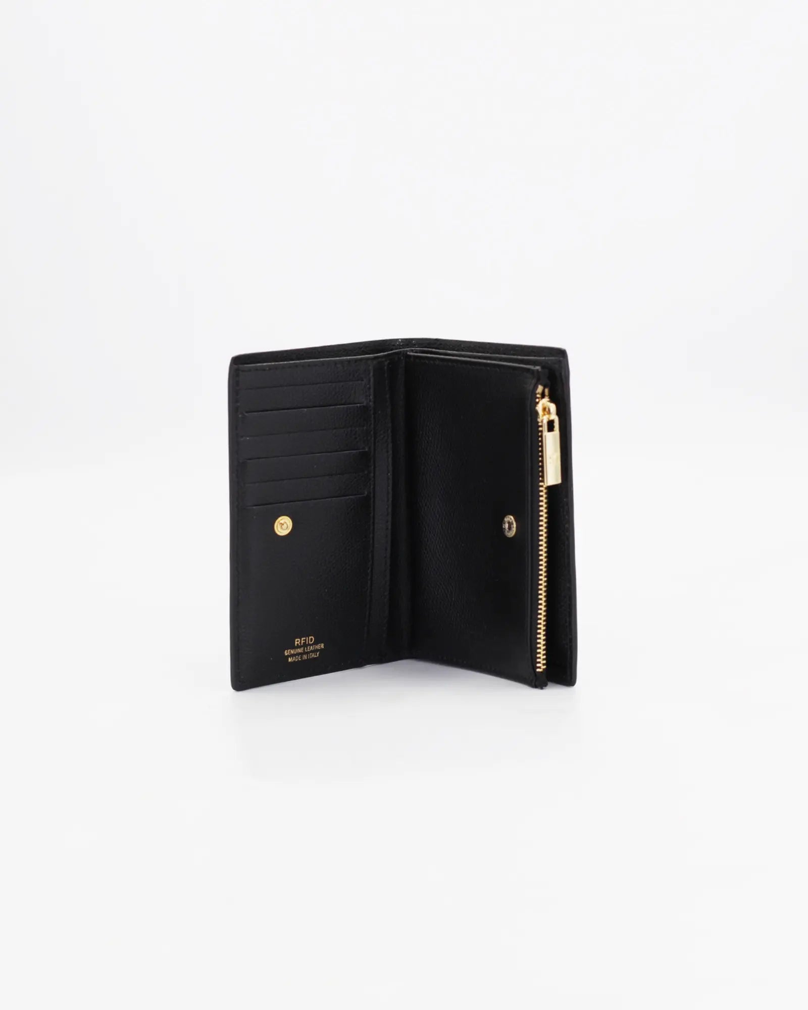 A small, lightweight wallet that can hold all the essentials. To have everything you need with you even on the most important evenings, without sacrificing style.

Internal details: double compartment with button closure, 6 credit card slots, 4 pockets, double bill compartment and zipped purse.
External details: gold embossed logo.
Lining: customised and internal slot in silk.

This soft full-grain calfskin, is worked to obtain an uniform grain, called tumbled leather. The remarkable fullness and roundness 