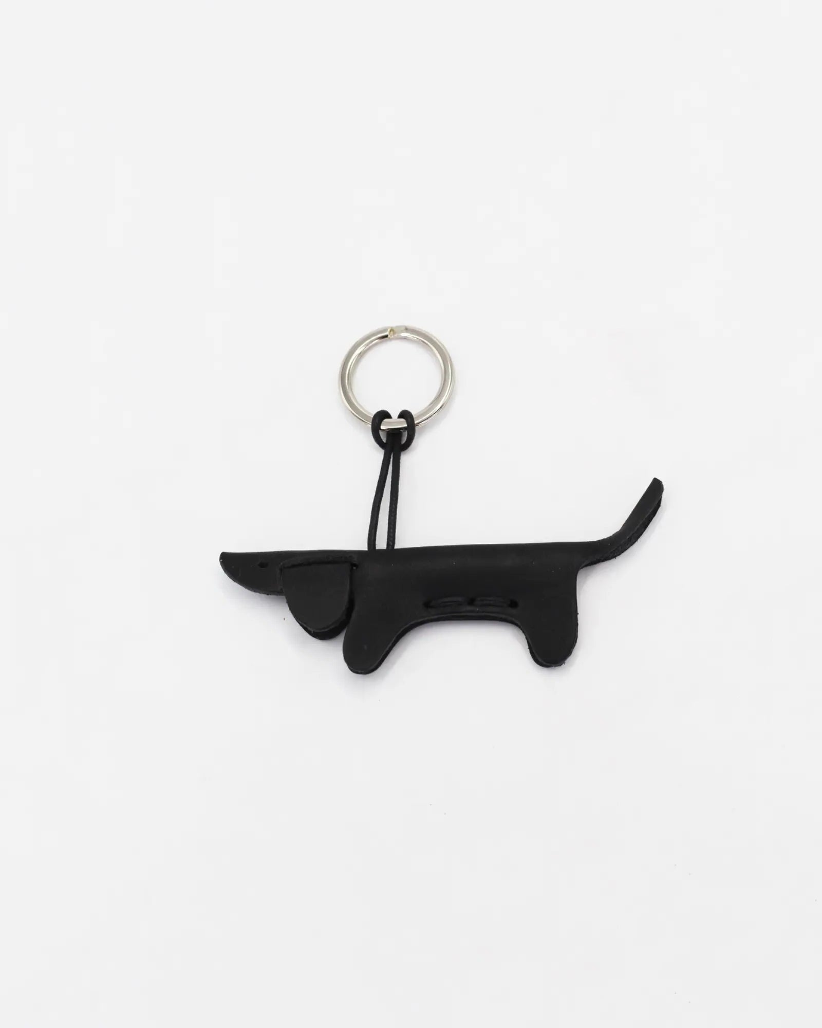 The Leather Dachshund. Small, considered, completely her own.

A quiet celebration of Italian artistry. Handcrafted from premium vegetable-tanned calfskin - free from toxic substances and entirely metal free - this dachshund keychain is the kind of detail that says everything without trying. The leather is naturally soft yet enduring, deepening in character with everyday wear. Finished with hand-stitched seams and a nickel key ring bearing a fire-printed logo.

Product height (cm) 5
Product width (cm) 10

M
