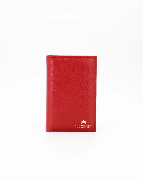 A small, lightweight wallet that can hold all the essentials. To have everything you need with you even on the most important evenings, without sacrificing style.

Internal details: double compartment with button closure, 6 credit card slots, 4 pockets, double bill compartment and zipped purse.
External details: gold embossed logo.
Lining: customised and internal slot in silk.

This soft full-grain calfskin, is worked to obtain an uniform grain, called tumbled leather. The remarkable fullness and roundness 