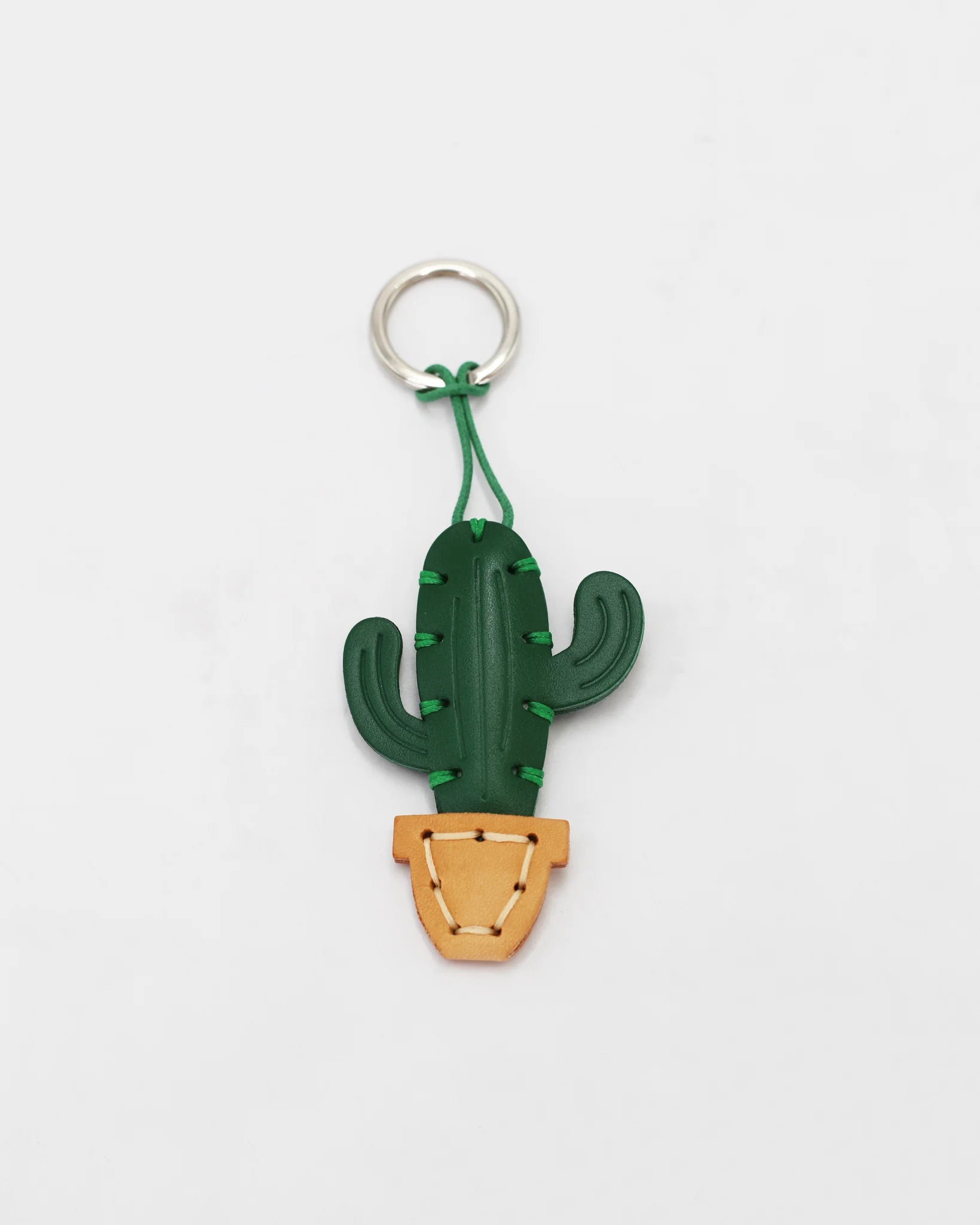 The Cactus. Small, considered, completely her own. Pairs perfectly with the Karoo Kollection.

Handcrafted in vegetable tanned leather by Cuoieria Fiorentina in Florence. Soft to the touch, precise in every seam. The kind of detail you don't need to explain - it speaks for itself, every time you reach for your keys.

Product height (cm) 5
Product width (cm) 5

Made in Italy. Made to last.