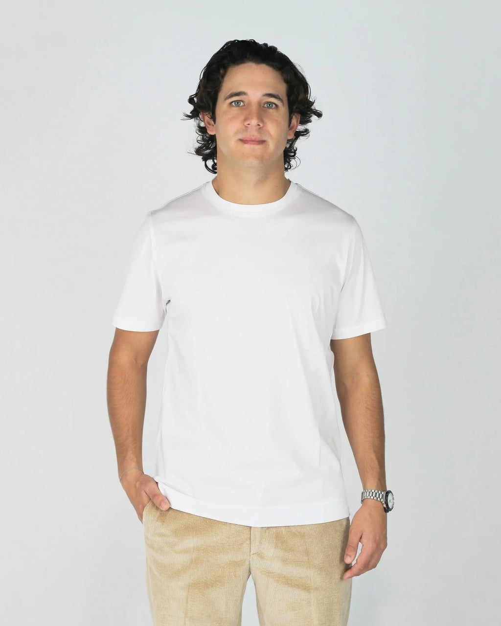 Elevate your everyday basics with the Fiftieth Men's White Crew Neck T-Shirt. Made from 100% merchandised cotton with a regular fit — simple, clean, and built to last.