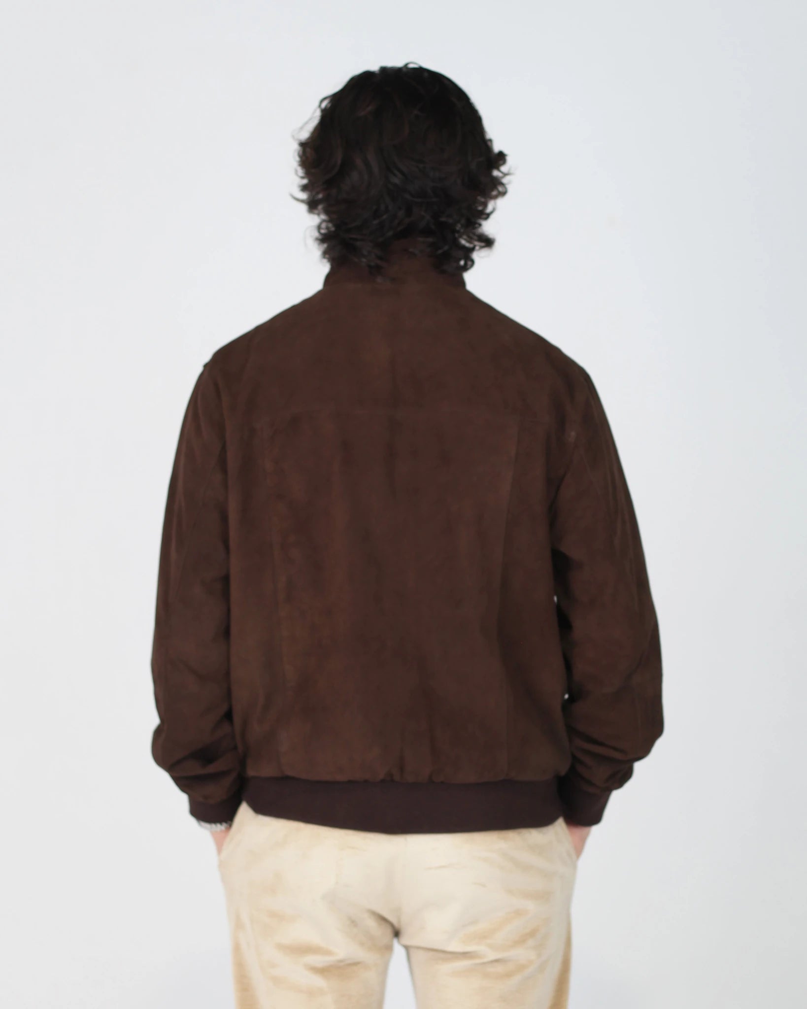 Composition: Premium Suede-Effect Fabric

Colour: Testa Di Moro

Style: Bomber Jacket

Fit: Regular

Collar: Ribbed Crew Neck&nbsp;

Details: Ribbed Cuffs and Hem, Zip Fastening

The Fusaro Antonio Bomber Jacket in Testa Di Moro (Dark Brown) is a wardrobe essential that bridges smart and casual effortlessly. Crafted in a luxurious suede-effect fabric, the rich cognac tone adds warmth and depth to any outfit. Featuring a classic zip-through silhouette with ribbed cuffs, collar and hem, this jacket offers a c