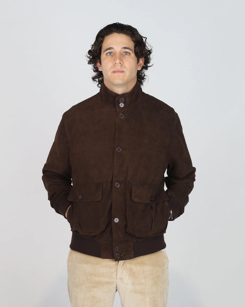 Composition: Premium Suede-Effect Fabric

Colour: Testa Di Moro

Style: Bomber Jacket

Fit: Regular

Collar: Ribbed Crew Neck&nbsp;

Details: Ribbed Cuffs and Hem, Zip Fastening

The Fusaro Antonio Bomber Jacket in Testa Di Moro (Dark Brown) is a wardrobe essential that bridges smart and casual effortlessly. Crafted in a luxurious suede-effect fabric, the rich cognac tone adds warmth and depth to any outfit. Featuring a classic zip-through silhouette with ribbed cuffs, collar and hem, this jacket offers a c