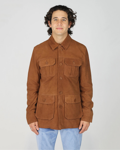 The Fusaro Antonio Men's Utility Jacket in Tabacco is a rugged yet refined layering piece that brings effortless character to any outfit. Cut in a rich tobacco-brown suede-effect fabric, this utility jacket features a classic shirt collar, button-through front and four front patch pockets for a functional, workwear-inspired aesthetic. The relaxed regular fit makes it an ideal transitional piece — dressed up over a knit or kept casual with denim.