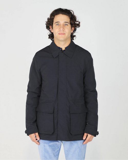 The Fusaro Antonio Rain Jacket in Sahara Blue is a sleek, functional layer built for unpredictable weather without compromising on style. Featuring a classic shirt collar, clean button-through front and a relaxed regular fit, this jacket transitions effortlessly from city streets to weekend adventures. The deep Sahara Blue tone makes it an easy layering piece over casual and smart-casual outfits alike.