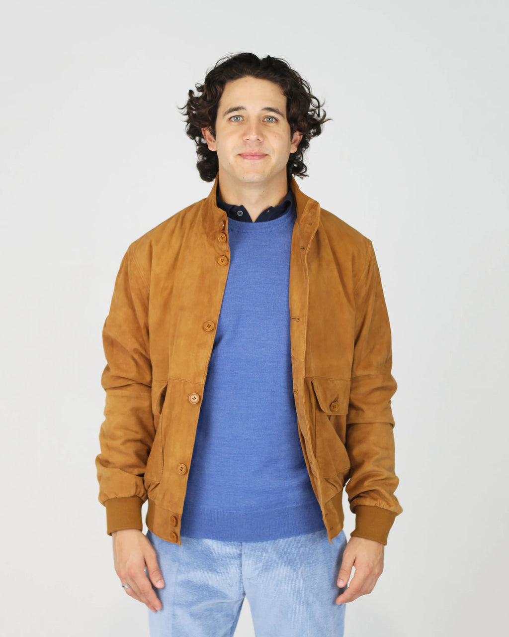 The Fusaro Antonio Bomber Jacket in Cognac is a wardrobe essential that bridges smart and casual effortlessly. Crafted in a luxurious suede-effect fabric, the rich cognac tone adds warmth and depth to any outfit. Featuring a classic zip-through silhouette with ribbed cuffs, collar and hem, this jacket offers a clean, tailored finish with everyday wearability.