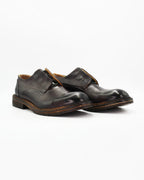 The Men's Derby in Leather Bronzato Dark Brown&nbsp;is a rugged yet refined lace-up with a rich, lived-in finish. The dark brown leather develops over time, giving each pair its own unique character.

A versatile shoe that sits comfortably between smart and casual — wear it with anything from tailored trousers to weekend denim.

Style: Derby
Feature: Double Lace&nbsp;
Colour: Bronzato Dark Brown
Material: Calf Leather
Sole Material: Leather

Code: JPU36526/270

Made in Italy