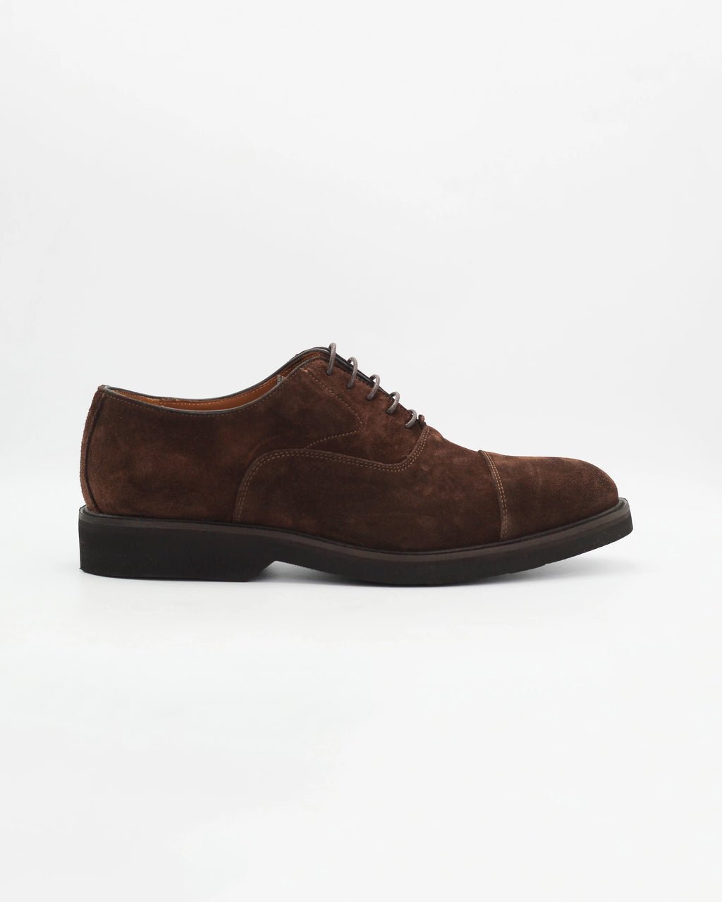 The Men's Oxford in Leather Suede Testa Di Moro&nbsp;is a refined take on a casual classic. The deep, rich suede upper gives it a luxurious texture and a subtle sophistication, while the clean derby silhouette keeps things understated and versatile.

Works equally well dressed up or down.

Style: Oxford
Colour: Testa Di Moro
Material: Calf Leather Suede
Sole Material: Rubber

Code: MER6649

Made in Italy