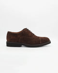 The Men's Oxford in Leather Suede Testa Di Moro&nbsp;is a refined take on a casual classic. The deep, rich suede upper gives it a luxurious texture and a subtle sophistication, while the clean derby silhouette keeps things understated and versatile.

Works equally well dressed up or down.

Style: Oxford
Colour: Testa Di Moro
Material: Calf Leather Suede
Sole Material: Rubber

Code: MER6649

Made in Italy