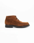 The Men's Chukka Boot in Suede Tan is a relaxed yet refined ankle boot crafted from soft tan suede. The clean, minimal silhouette and lace-up front make it a versatile go-to — equally at home with chinos, cords, or casual denim.

The suede upper gives it a relaxed, lived-in feel that only gets better with wear.&nbsp;
Style: Chukka Boot
Feature: Stitch Details
Colour: Marrone Tan
Material: Calf Leather Suede
Sole Material: Rubber

Code: MERS8890

Made in Italy