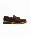 The Men's Tassel Moccasin in Leather Suede Brown is a refined slip-on with a distinctly classic character. Rich dark brown suede and a signature tassel detail give this loafer an effortlessly polished look, while the tan rubber sole adds a casual contrast finish.

Dress it up with tailored trousers or keep it casual with dark chinos — it works either way.&nbsp;


Style: Moccasin&nbsp;
Feature: Tassle
Colour: Testa Di Moro Dark Brown
Material: Calf Leather Suede
Sole Material: Rubber

Code: MER7013

Made in 