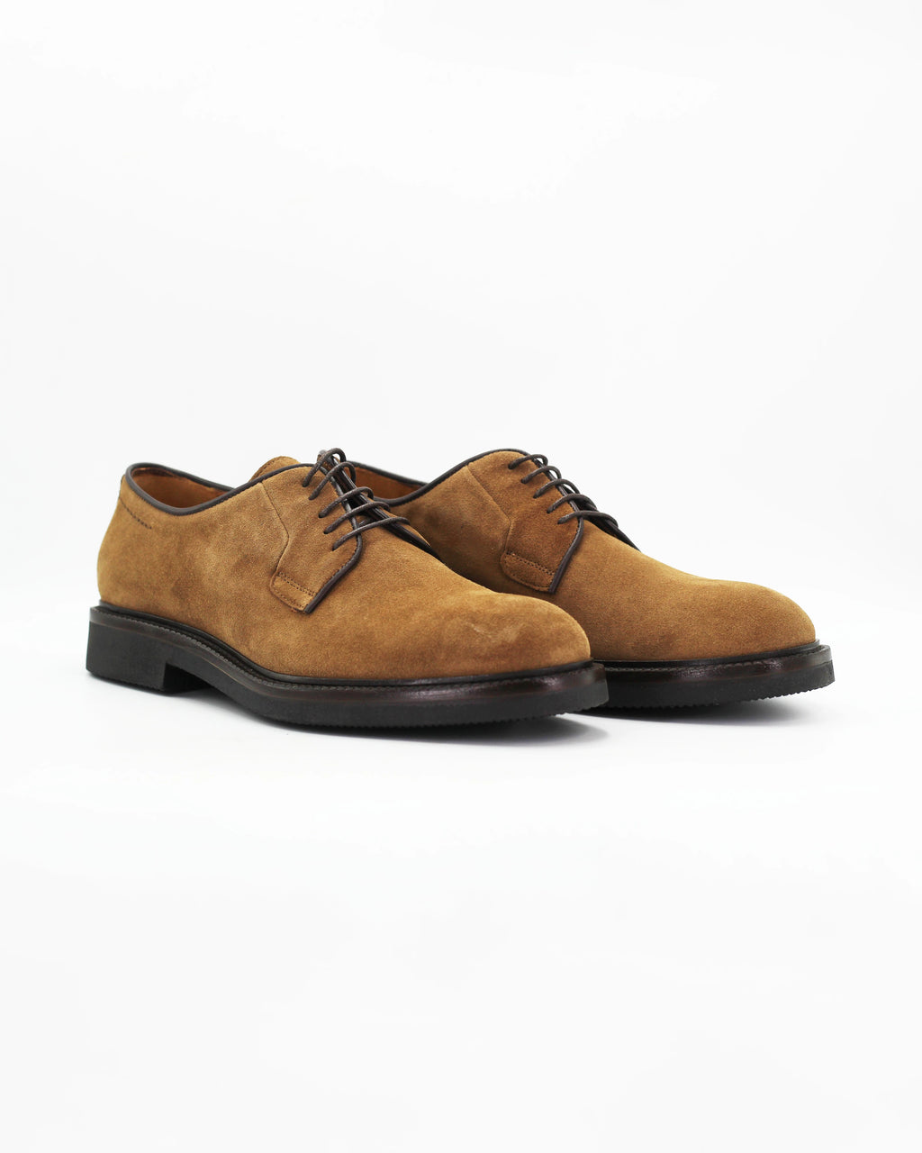 The Men's Derby in Leather Suede Castoro Beige&nbsp;is a relaxed take on the classic dress shoe. The soft tan suede upper gives it a warm, textured feel, while the clean derby silhouette keeps it smart enough for the office and casual enough for the weekend.

A wardrobe staple that pairs effortlessly with chinos, cords, or dark denim.
&nbsp;
Style: Derby
Feature: Light Sole
Colour: Castoro Beige
Material: Calf Leather Suede
Sole Material: Rubber

Code: MER8097

Made in Italy