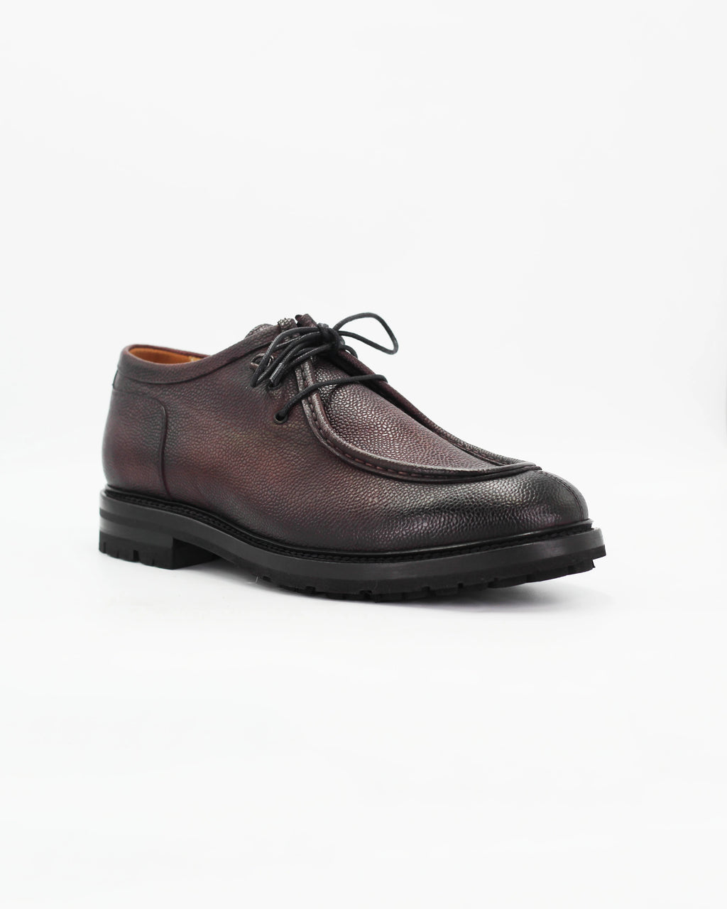 The Men's Derby Shoe in Leather Burgundy is a classic lace-up dress shoe with a refined edge. Crafted from rich burgundy leather, it strikes the perfect balance between formal and everyday wear.

The open-lacing derby construction offers a slightly more relaxed fit than an Oxford, making it as comfortable as it is sharp.
&nbsp;
Style: Derby
Feature: Hammered Effect
Colour: Burgundy
Material: Calf Leather
Sole Material: Rubber&nbsp;

Code: BRU12150