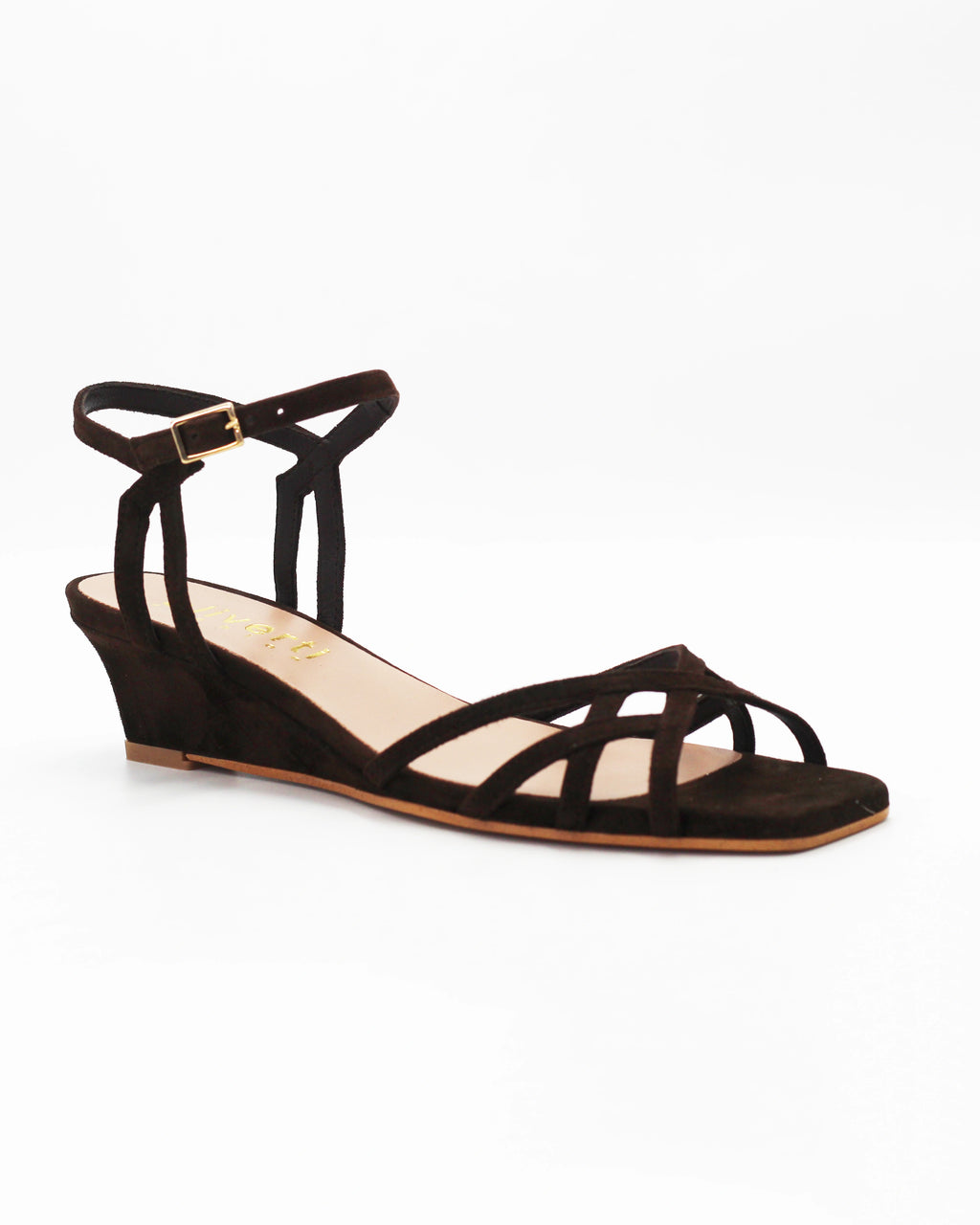 Shop the LYA8 wedge heel sandal in dark brown suede calf leather. Italian-made with a woven strap detail, adjustable ankle strap, and rubber sole. Elevated summer elegance.
