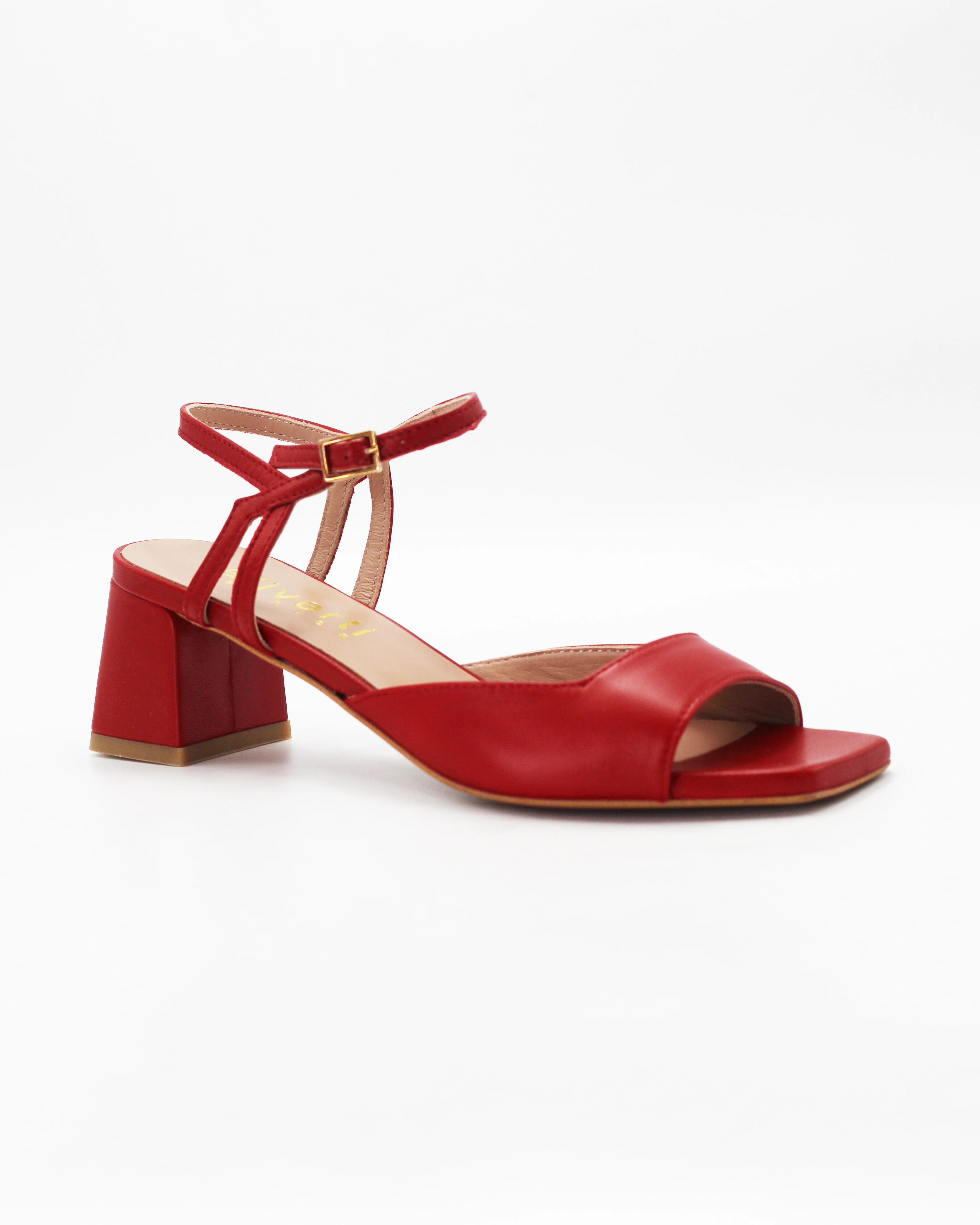 Shop the OPERA11 block heel sandal in rich rosso calf leather. Open toe, secure ankle strap, and a comfortable rubber sole, made in Italy. Effortless elegance.