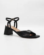 Shop the OPERA11 block heel sandal in black calf leather. Italian-made with an adjustable ankle strap and durable rubber sole. Effortless everyday elegance.
