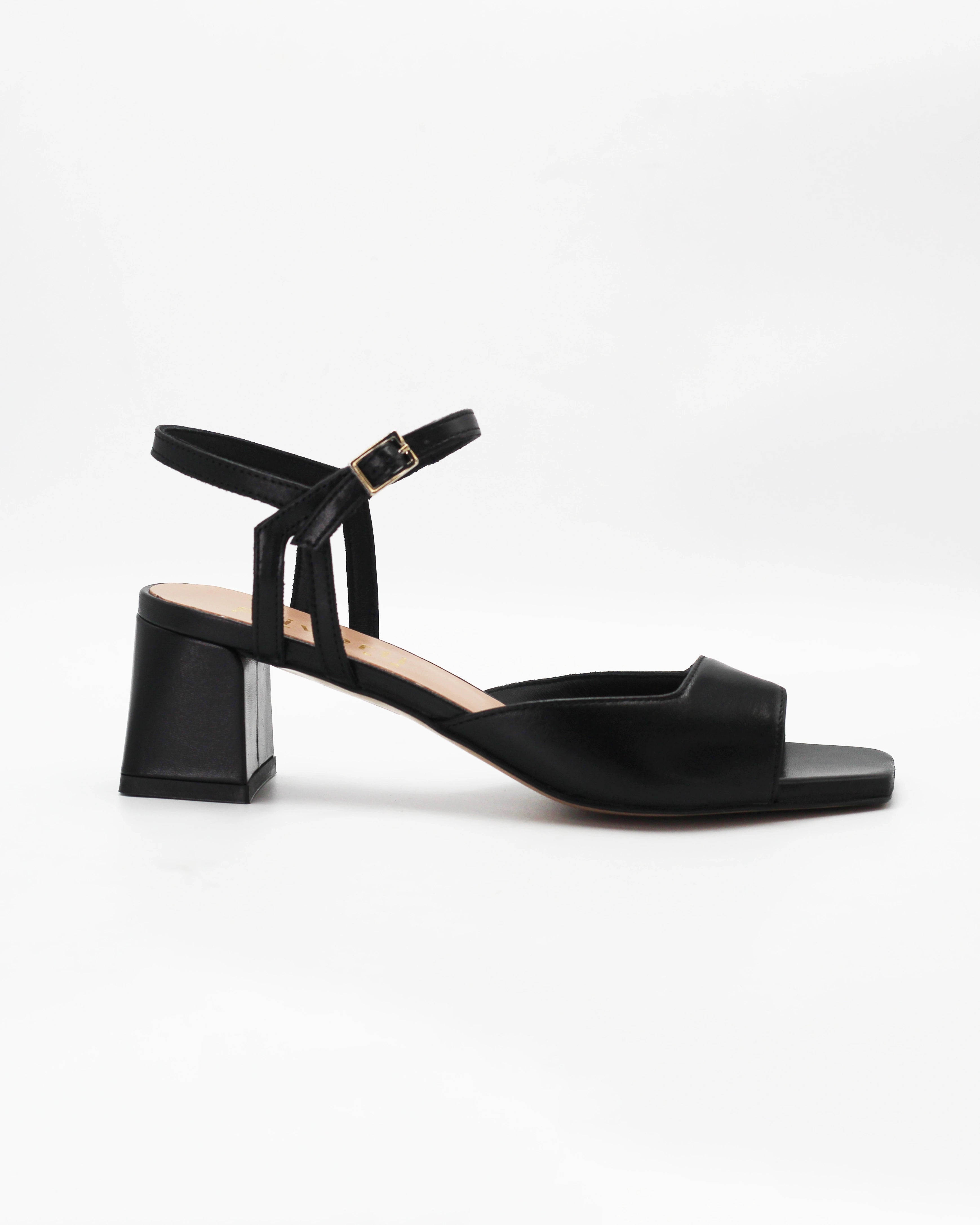 Shop the OPERA11 block heel sandal in black calf leather. Italian-made with an adjustable ankle strap and durable rubber sole. Effortless everyday elegance.