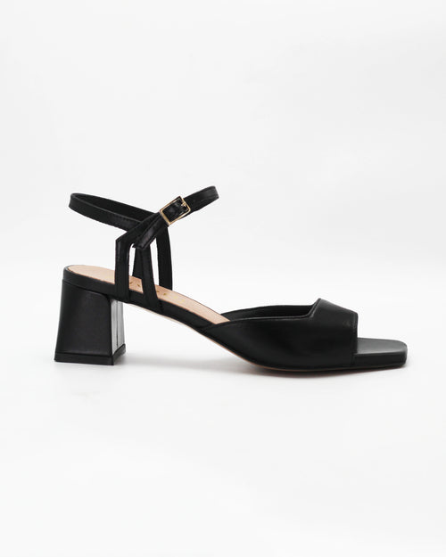 Shop the OPERA11 block heel sandal in black calf leather. Italian-made with an adjustable ankle strap and durable rubber sole. Effortless everyday elegance.