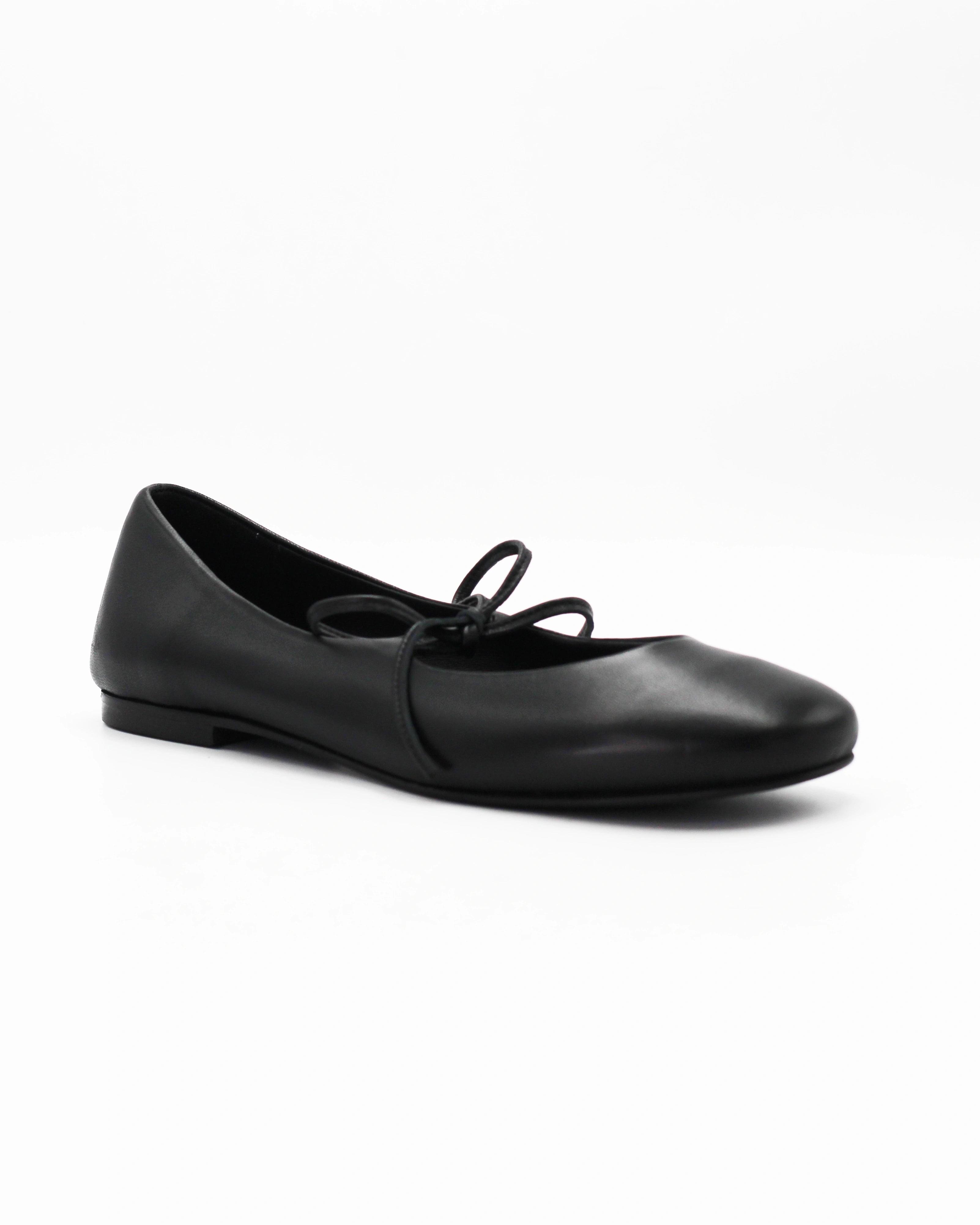 Elegant black ballerina pumps in Nero calf leather with a delicate lace-up bow. Handcrafted in Italy with a durable rubber sole. Timeless everyday luxury.