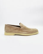 Shop the UO32017 slip-on loafer in seppia suede calf leather. Italian-made with a soft unstructured silhouette and rubber sole. Refined everyday elegance.