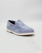 Shop the D032018 slip-on loafer in light blue suede calf leather. Italian-made with a soft unstructured silhouette and rubber sole. Relaxed everyday elegance.